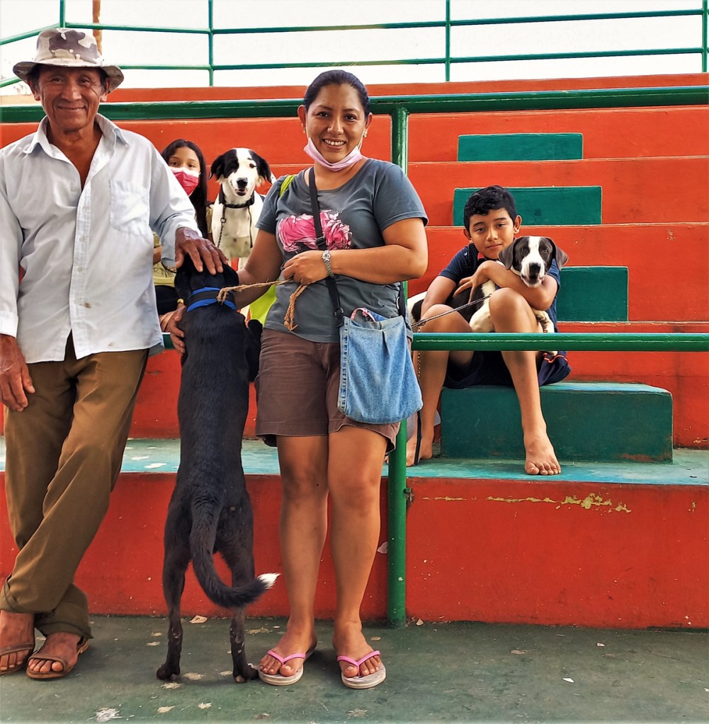 Mexican family with their pets attending a pet sterilisation clinic in Mexico